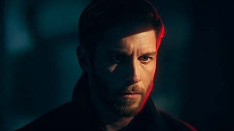 Cinematic Portrait: Moody film-quality character portrait with dramatic shadows.