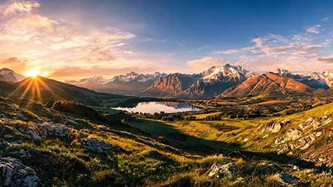 Epic Landscape: Grand sweeping scenery and aerial views in golden light.